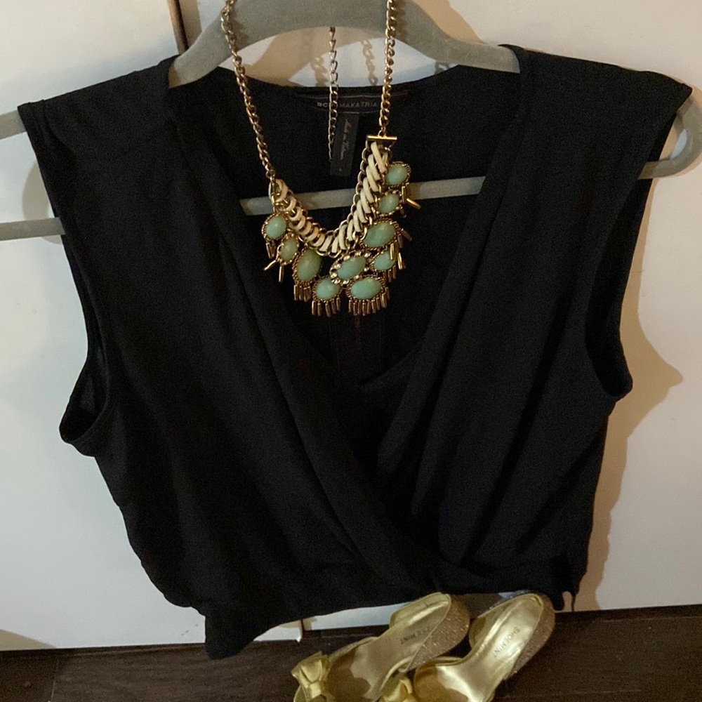 Black BCBG semi sheer sleeveless top woman’s size Large